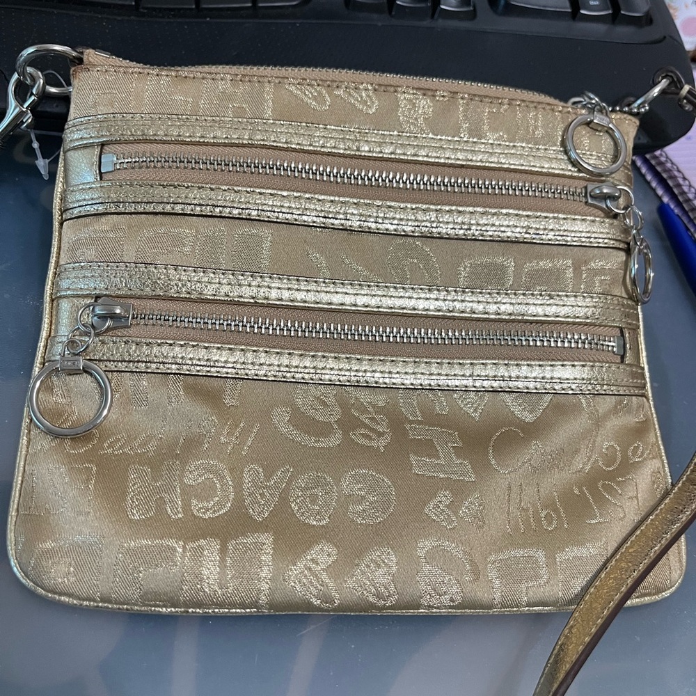 Gold Coach Crossbody Bag from the Poppy Collection